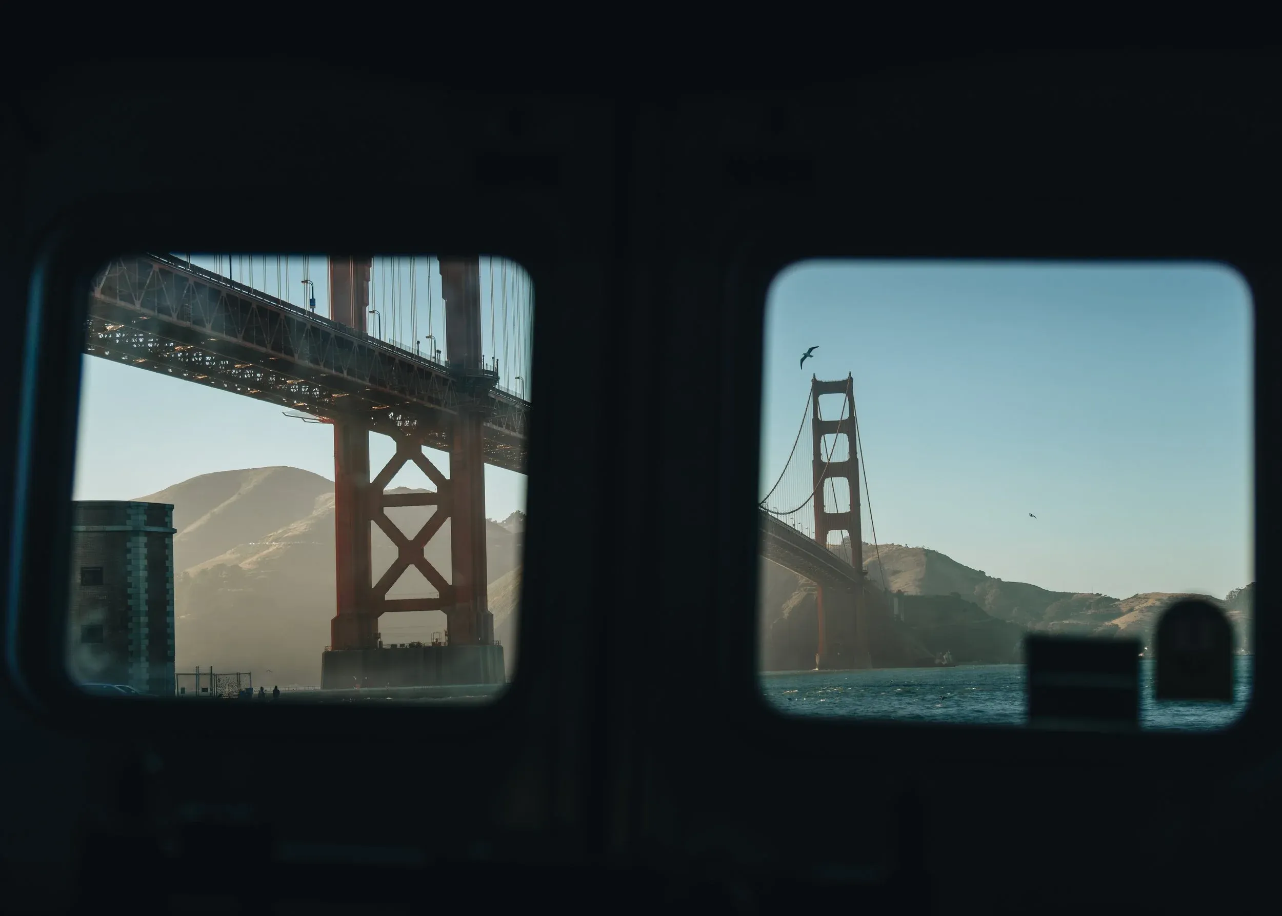 The Golden Gate Bridge through a vehicle window